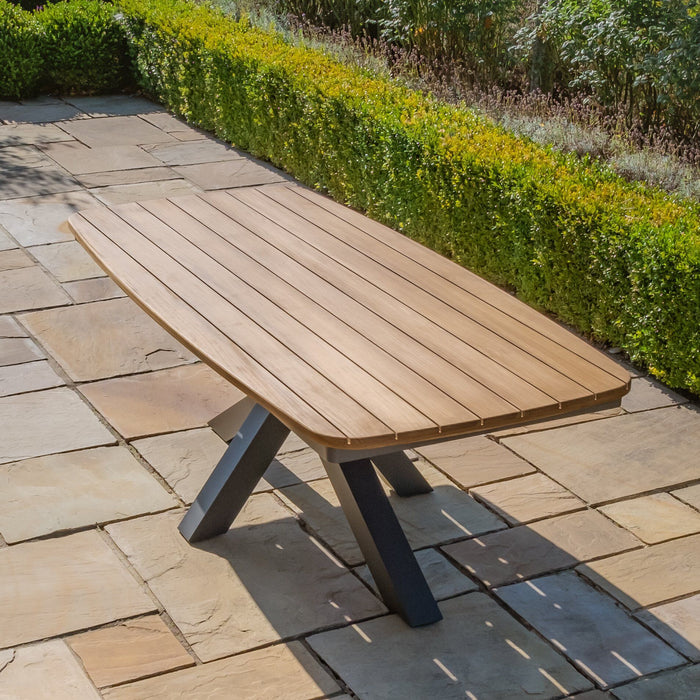 Jakarta Teak Oval Dining Table with 6 Rattan Winchester Heritage Rattan Dining Chairs