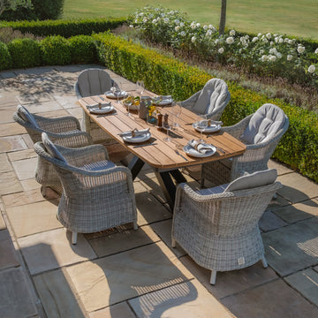 Jakarta Teak Oval Dining Table with 6 Rattan Oxford Hertiage Rattan Dining Chairs