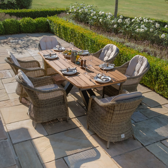 Jakarta Teak Oval Dining Table with 6 Rattan Winchester Heritage Rattan Dining Chairs