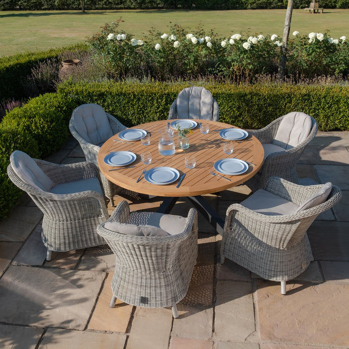 Jakarta Teak Round Dining Table with 6 Rattan Oxford Hertiage Rattan Dining Chairs