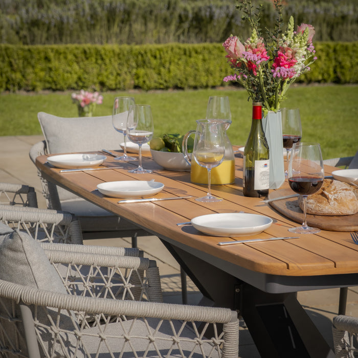 Jakarta Teak Oval Dining Table with 8 Monaco Cool Linen Rope Weave Dining Chairs