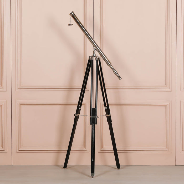 Nickel Telescope on Black Wooden Stand
