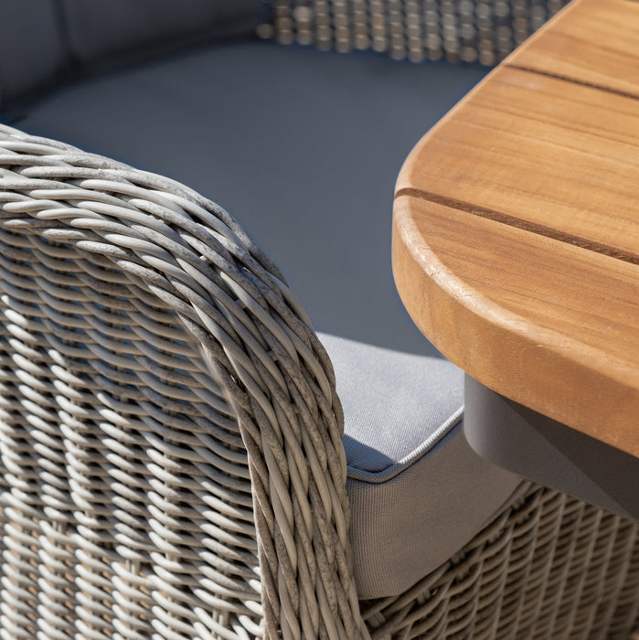 Jakarta Teak Oval Dining Table with 6 Rattan Oxford Hertiage Rattan Dining Chairs