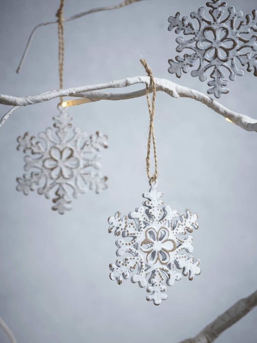 Ten White Metal Snowflakes