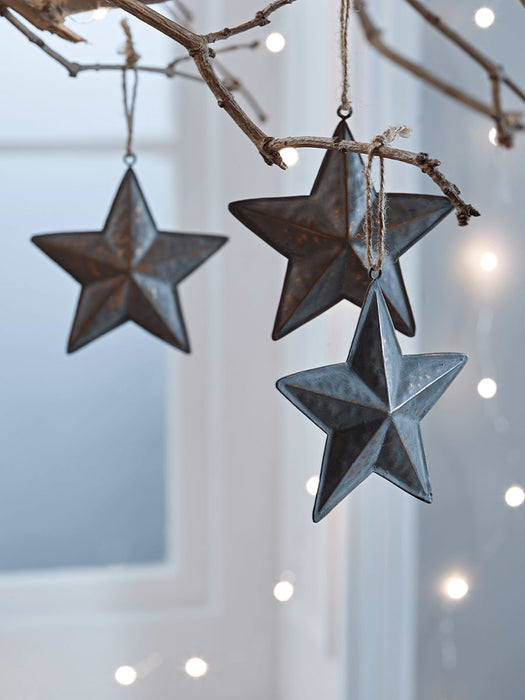 Five Verdigris Hanging Stars