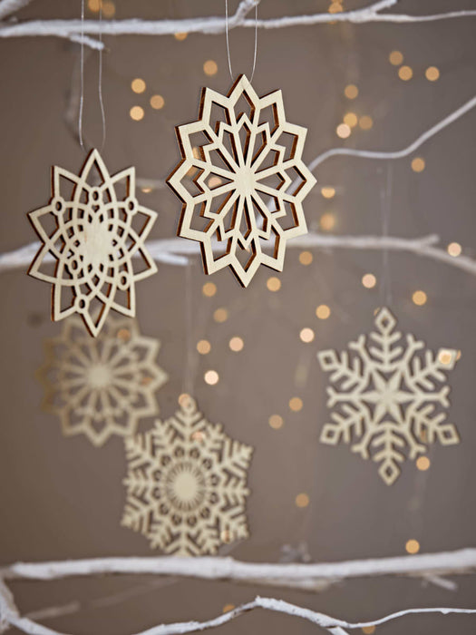 Twelve Plywood Snowflakes