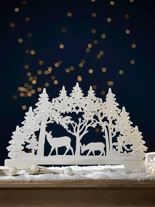 Lit Midwinter Deer Scene