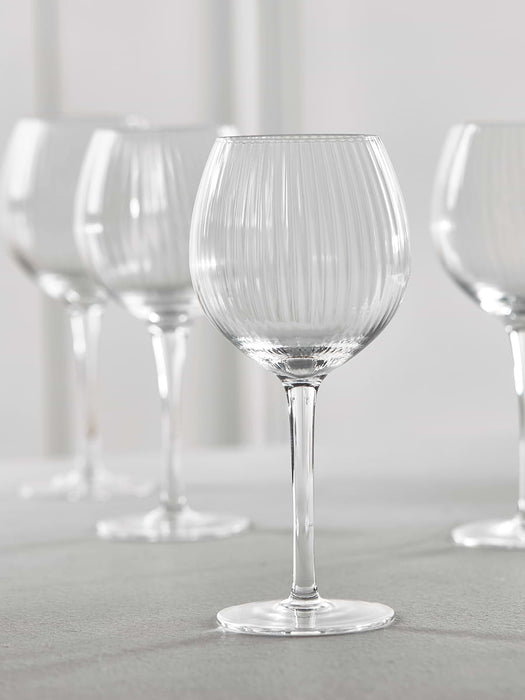 Four Fluted Wine Glasses