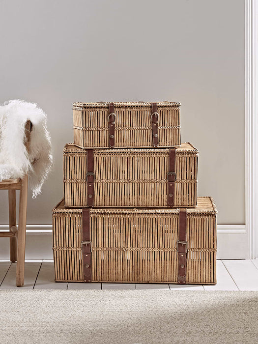 Three Flat Rattan Trunks