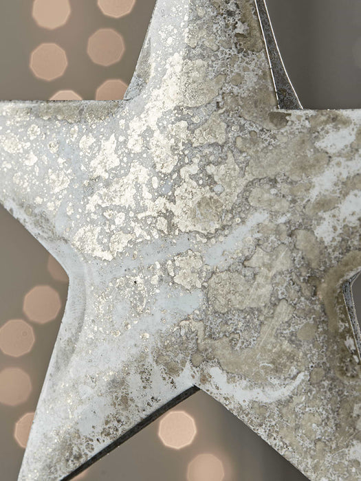Three Burnished Metallic Stars
