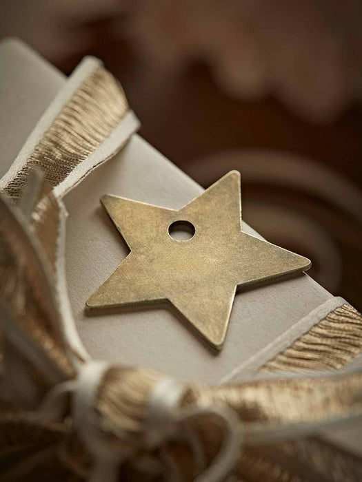Six Distressed Metal Star Wrapping Charms