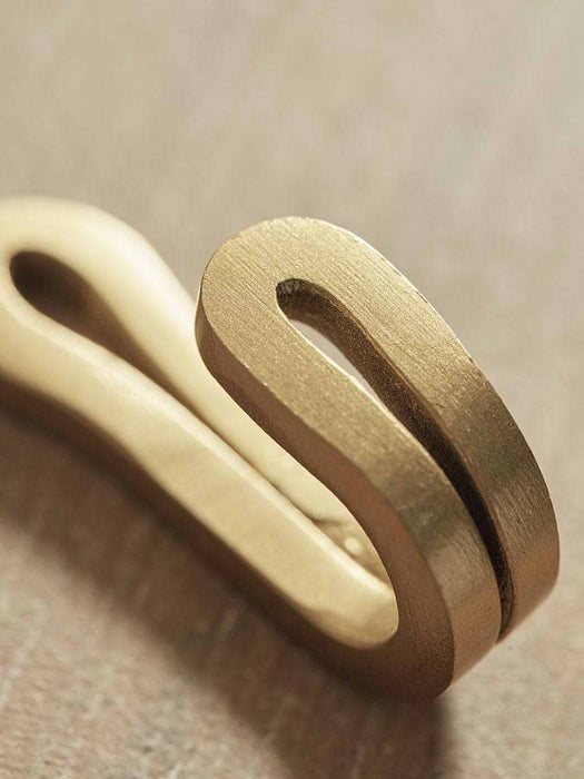 Four Small Brass Hooks