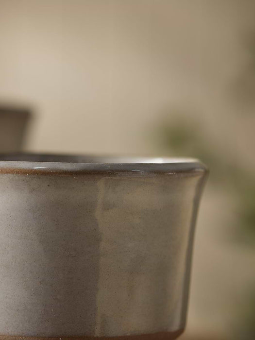Two Glazed Stoneware Coffee Cups