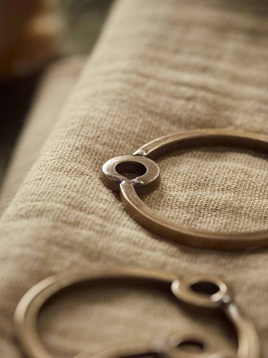 Four Brass Napkin Rings with Loops