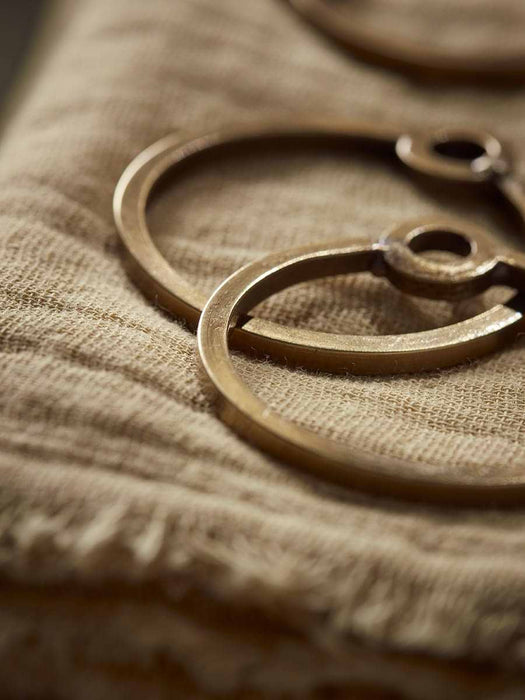 Four Brass Napkin Rings with Loops