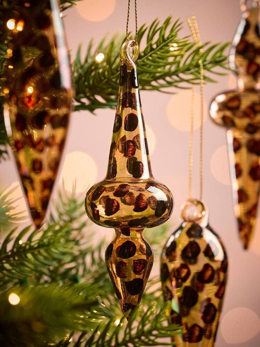 Four Leopard Print Glass Finials