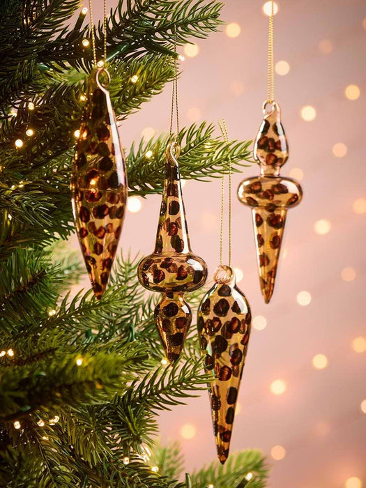 Four Leopard Print Glass Finials
