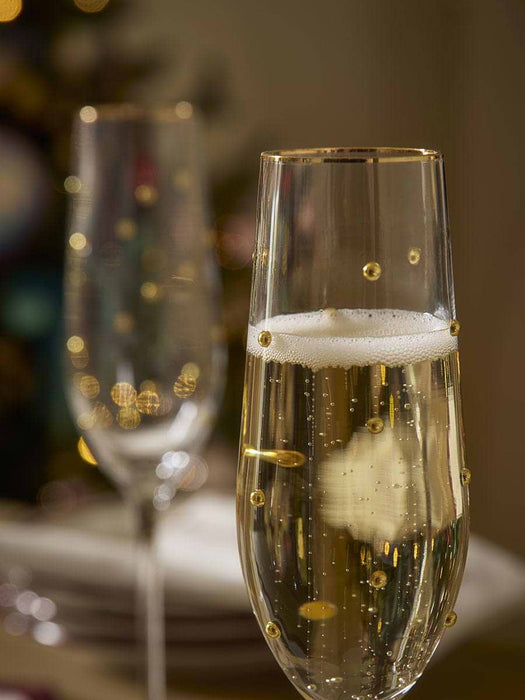 Four Gold Dot Champagne Glasses