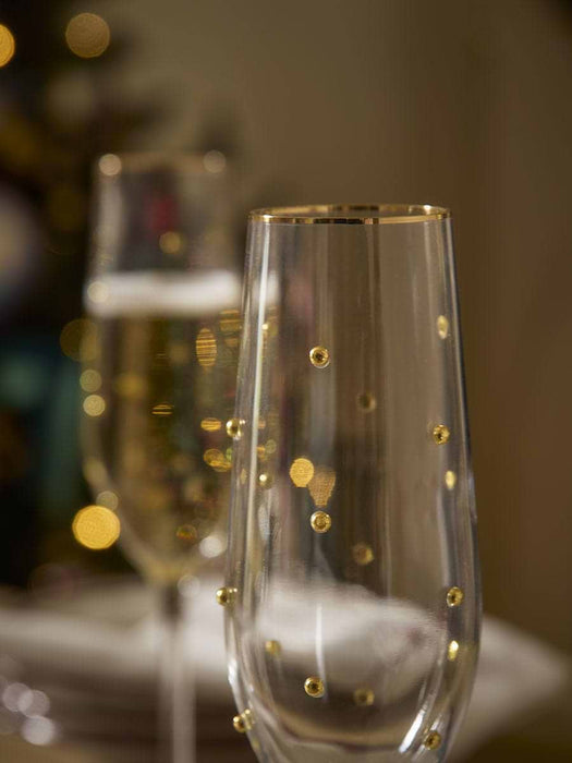 Four Gold Dot Champagne Glasses