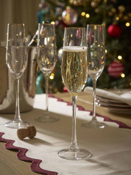 Four Gold Dot Champagne Glasses