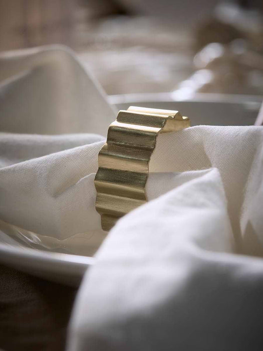 Four Metal Ridged Napkin Rings