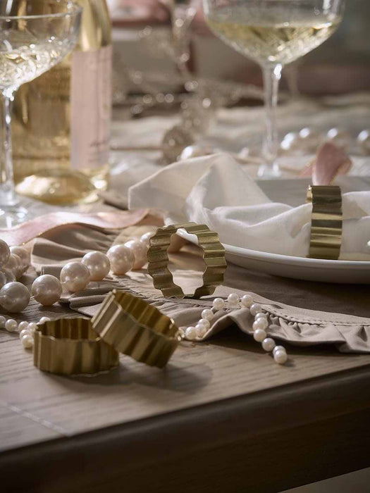 Four Metal Ridged Napkin Rings