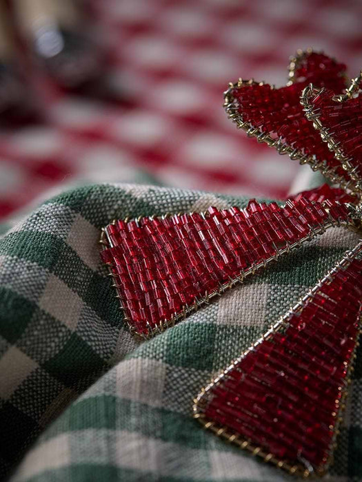 Four Beaded Bow Napkin Rings