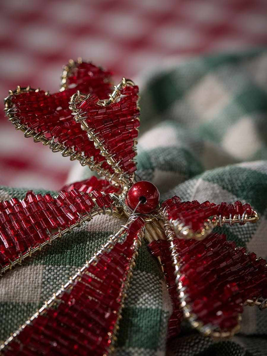 Four Beaded Bow Napkin Rings
