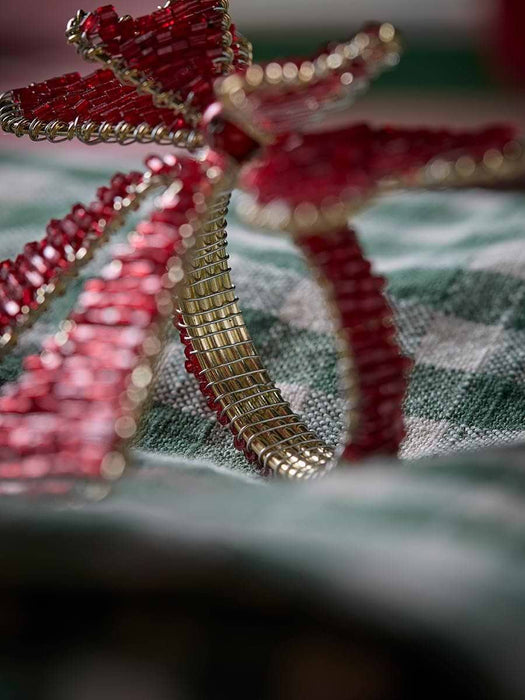 Four Beaded Bow Napkin Rings