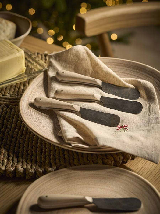 Four Oak Handle Butter Knives
