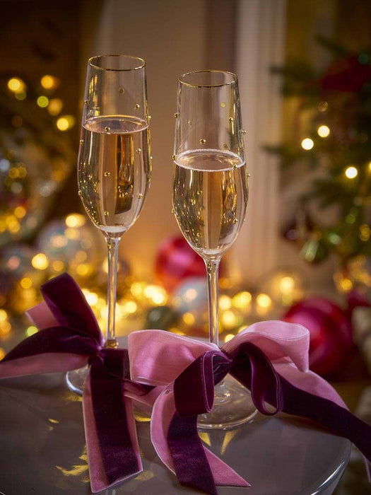 Four Gold Dot Champagne Glasses