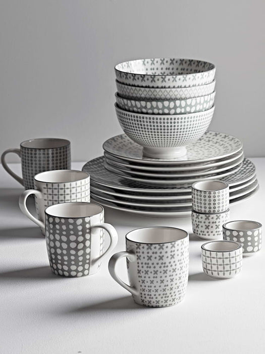 Four Grey Folk Egg Cups