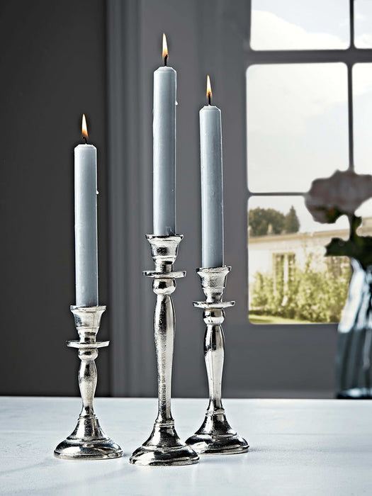 Three Antiqued Silver Candlesticks