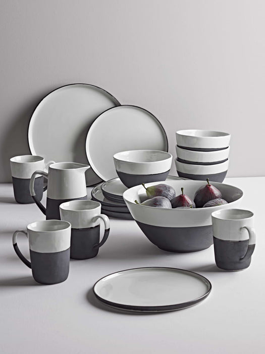 Four Monochrome Stoneware Dinner Plates