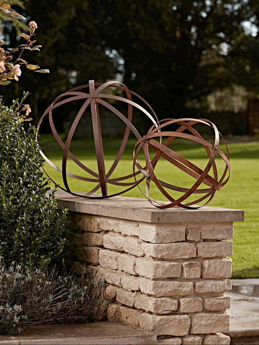 Two Rusty Sphere Decorations