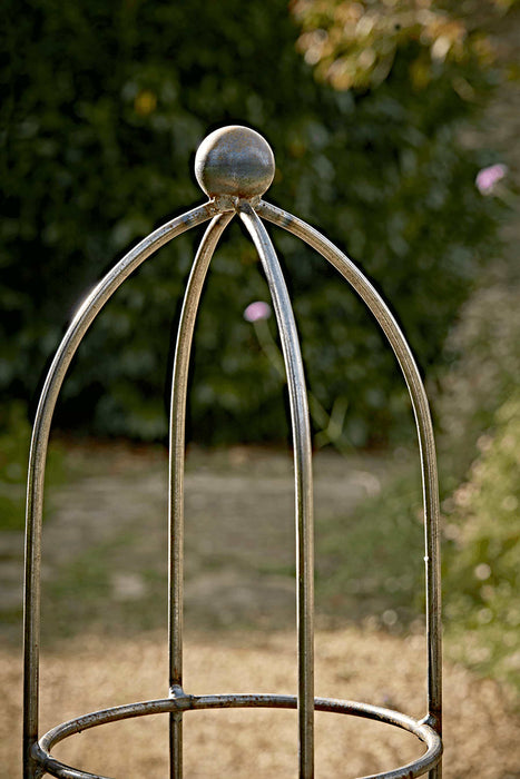 Three Raw Steel Obelisks