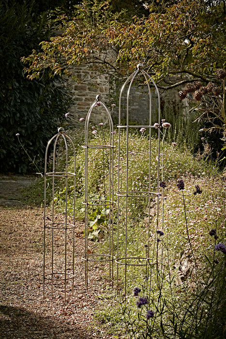 Three Raw Steel Obelisks