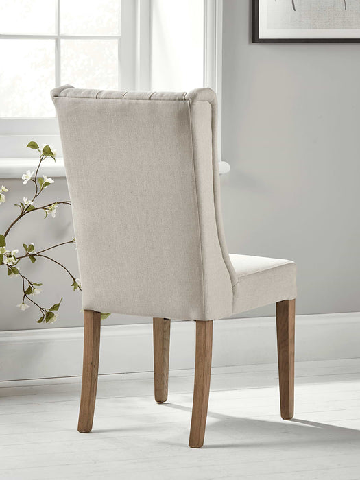Two Buttoned Linen Dining Chairs