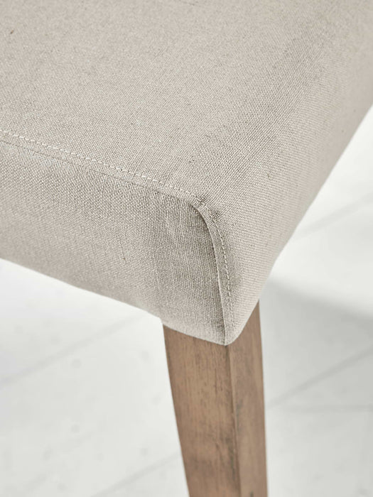 Two Buttoned Linen Dining Chairs