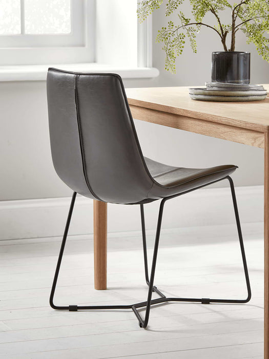 Two Miro Dining Chairs