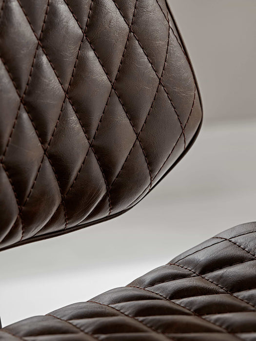 Two Quilted Dining Chairs