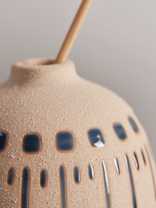 Two Resist Glaze Bud Vases