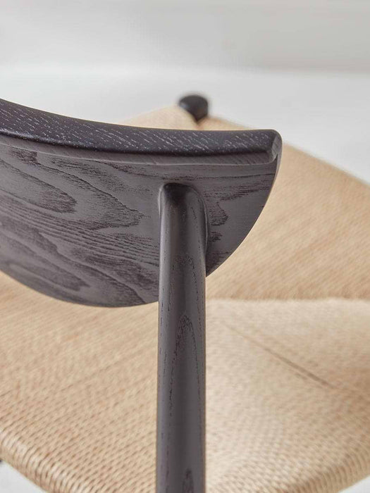 Two Black & Natural Woven Dining Chairs