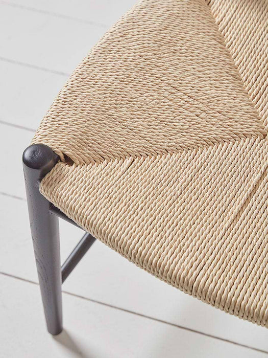 Two Black & Natural Woven Dining Chairs