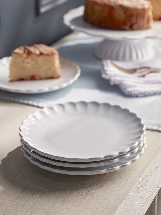 Four Scalloped Edge Side Plates
