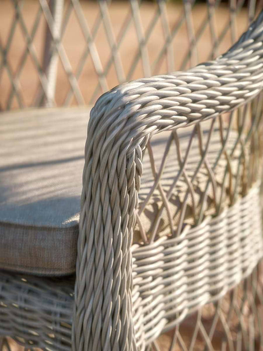 Two Open Weave Dining Chairs