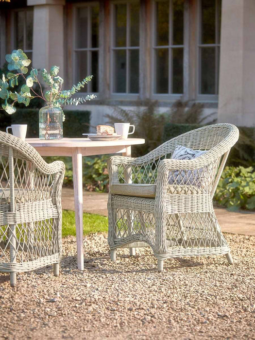 Two Open Weave Dining Chairs