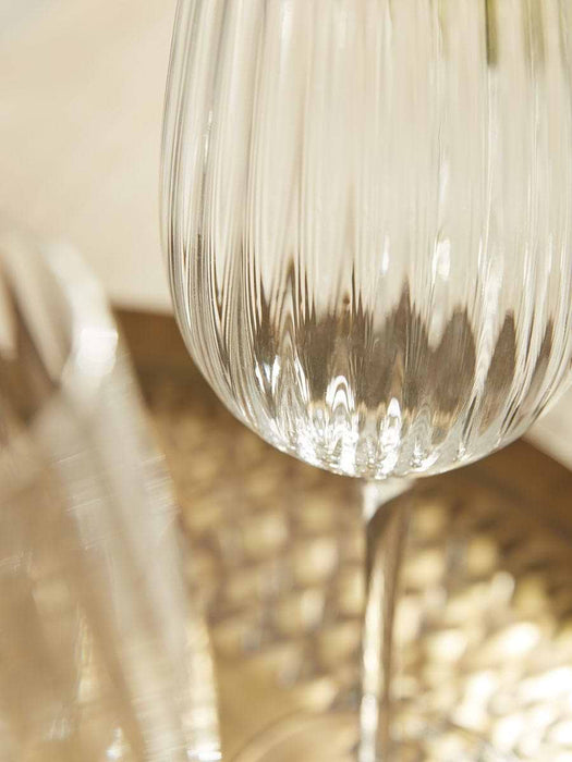 Four Fluted Wine Glasses