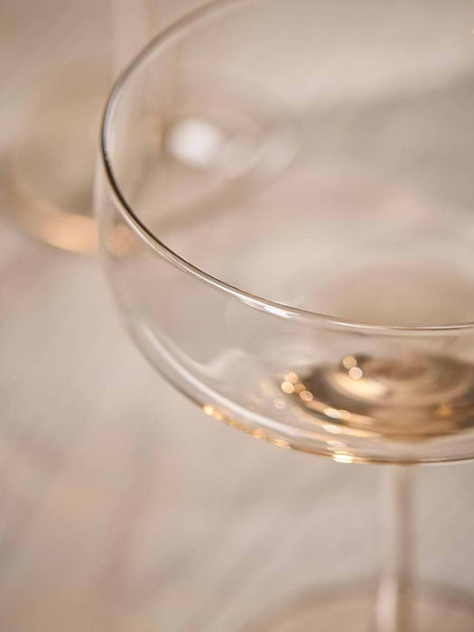 Four Golden Champagne Coupes