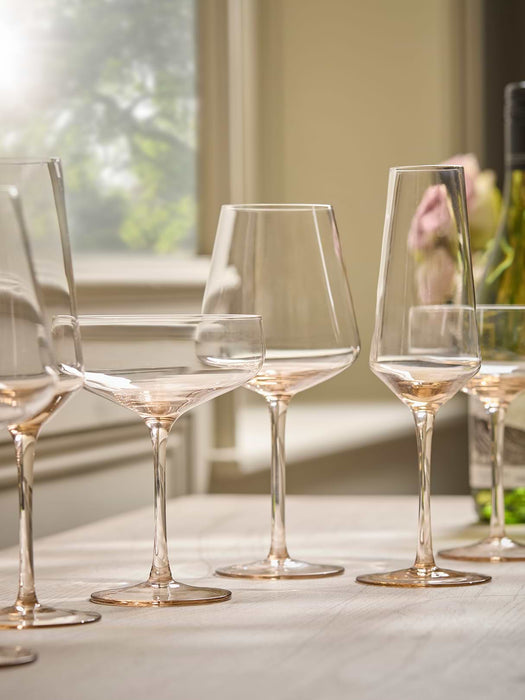 Four Golden Champagne Coupes